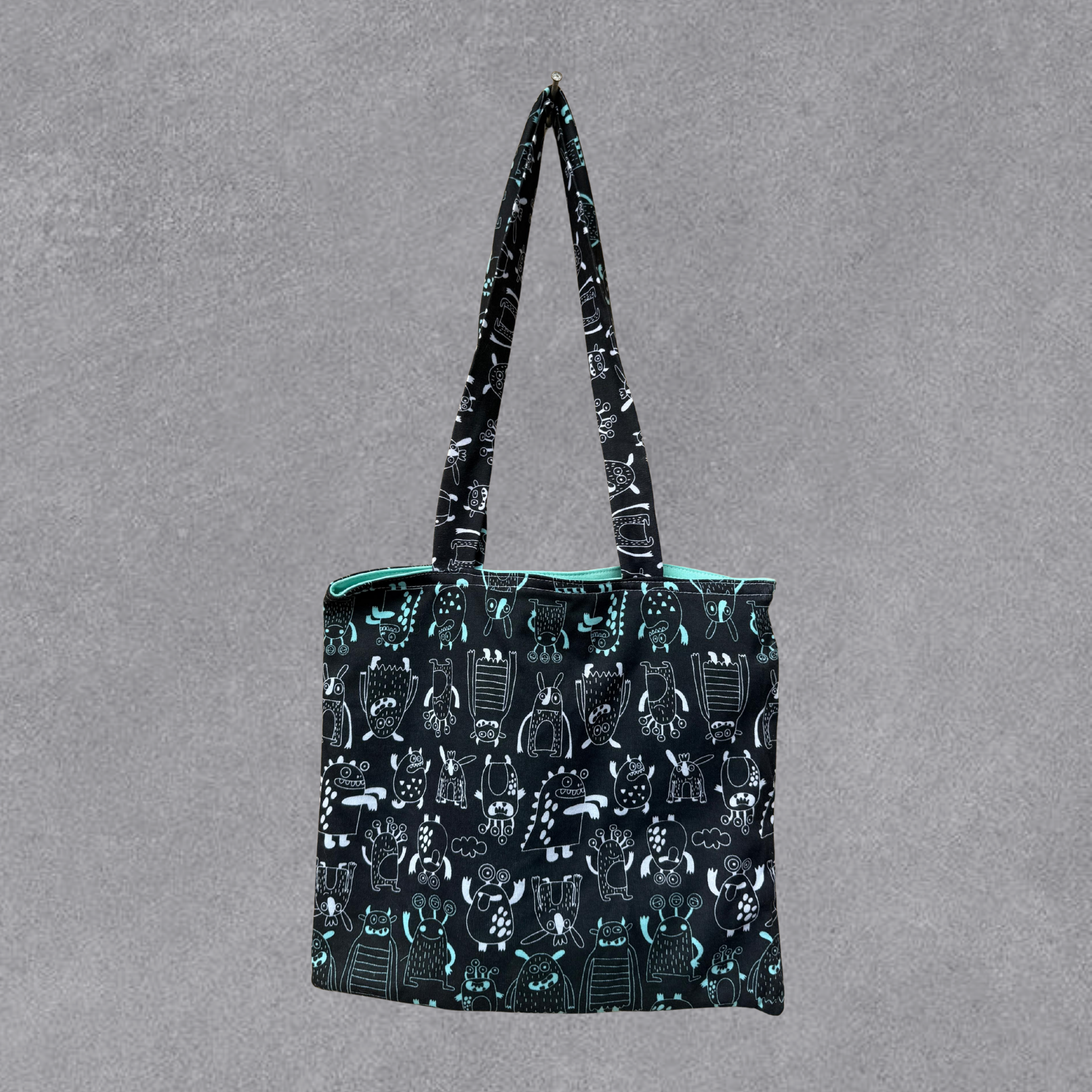 Tote Bag Estampada Monstruos Negro